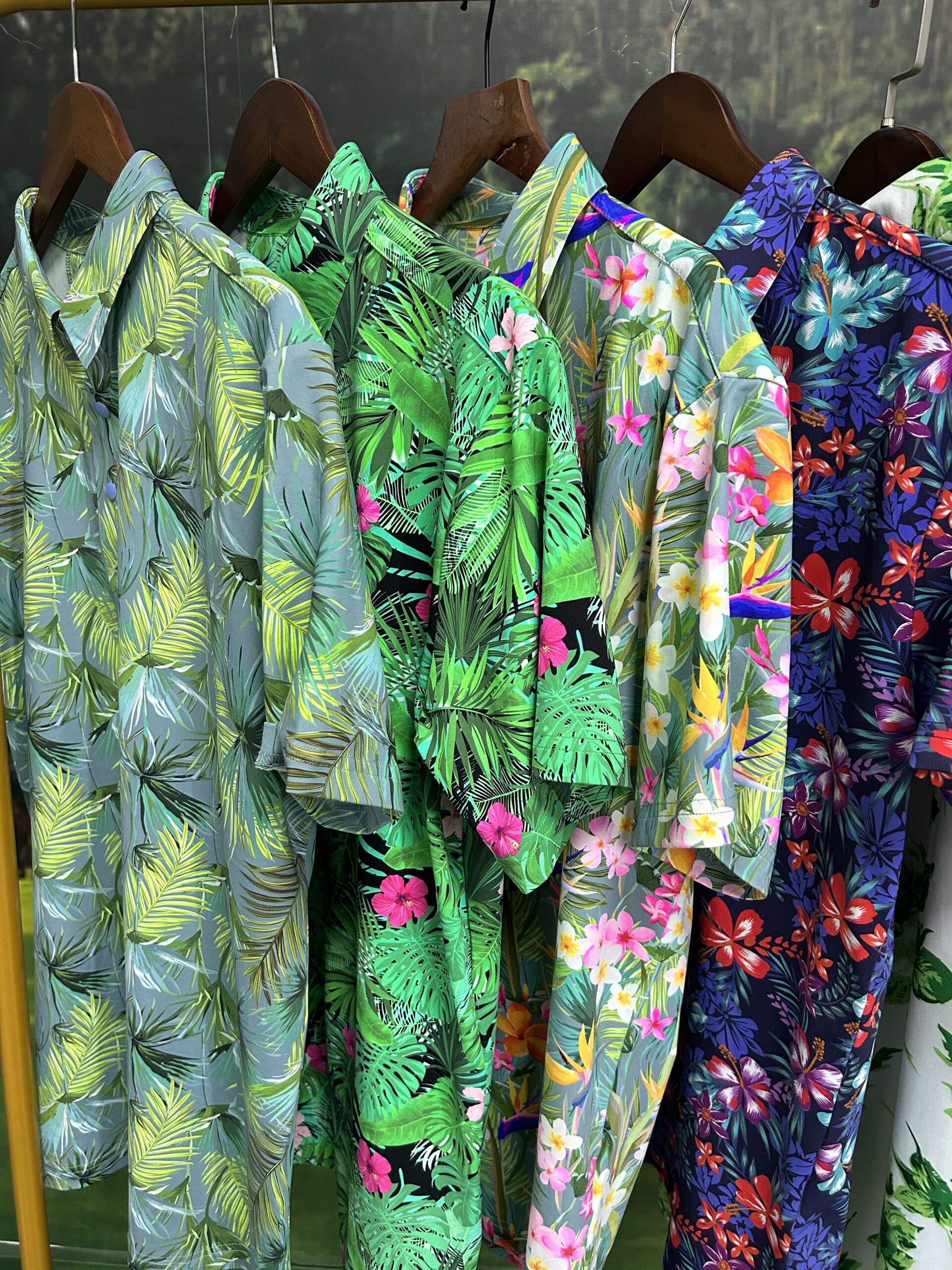 Bulk customizable golf shirts with various tropical and floral patterns for brand OEM/ODM orders